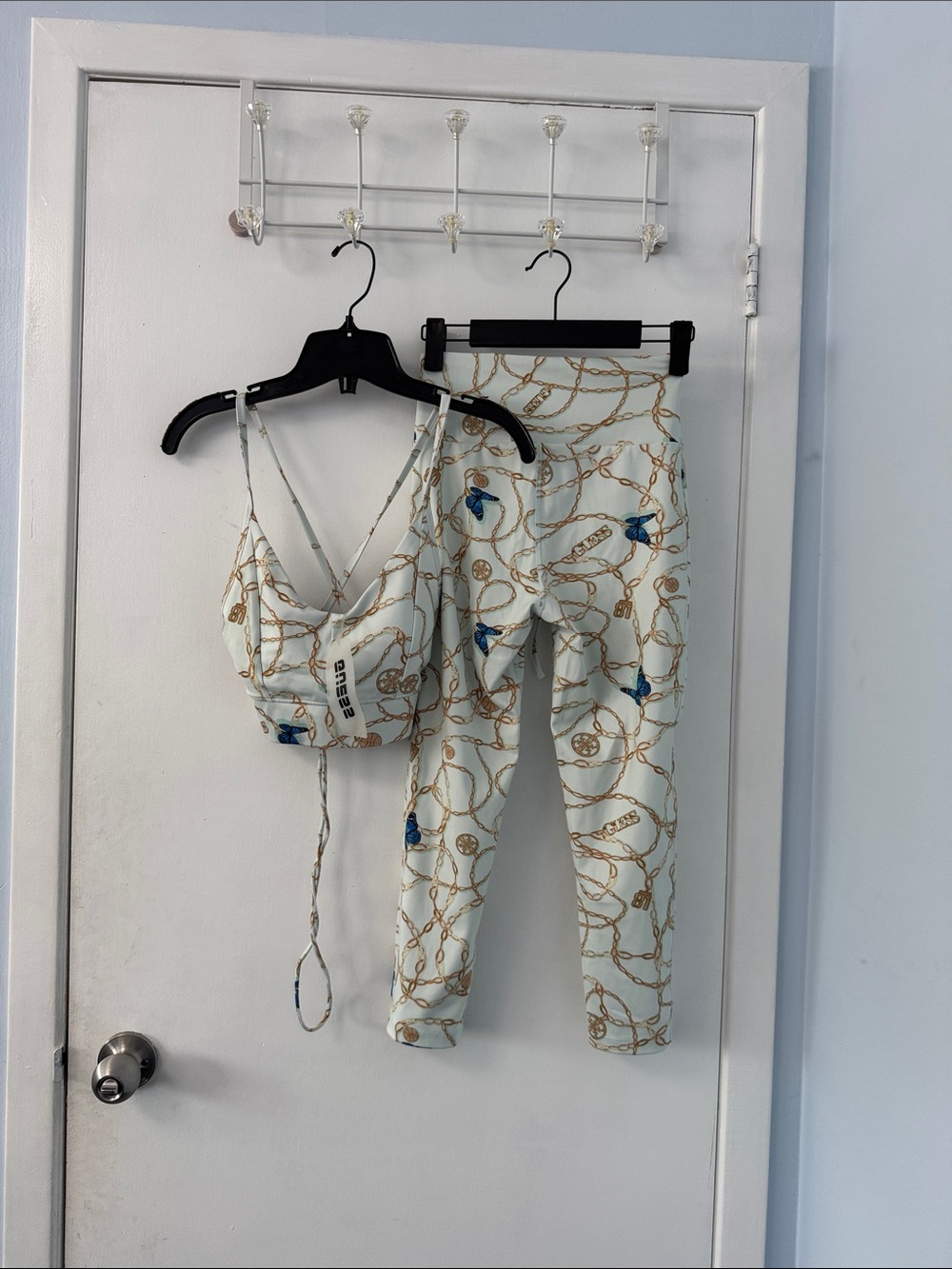 Guess White Leggings & Cropped Tank Set with Gold Chain and Blue Accents